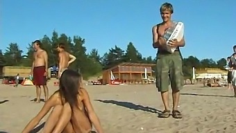 Stunning Young Girl Enjoys Nude Beach Activities