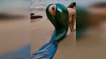 A Stranger Vigorously Penetrates A Mermaid On The Beach, Causing Her Tight Anal Passage To Gape Widely